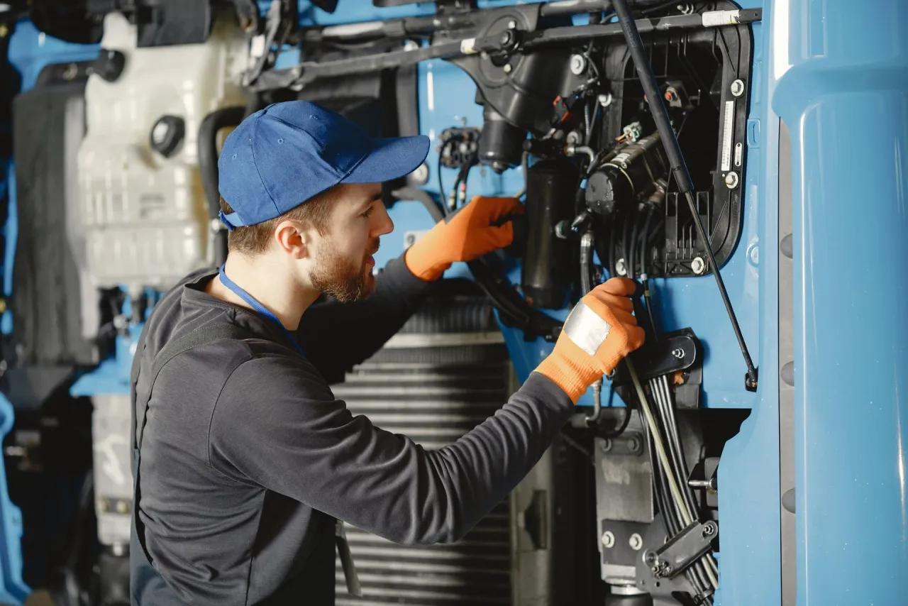 Technician servicing industrial equipment for an Edwardsville, IL electric motor customer